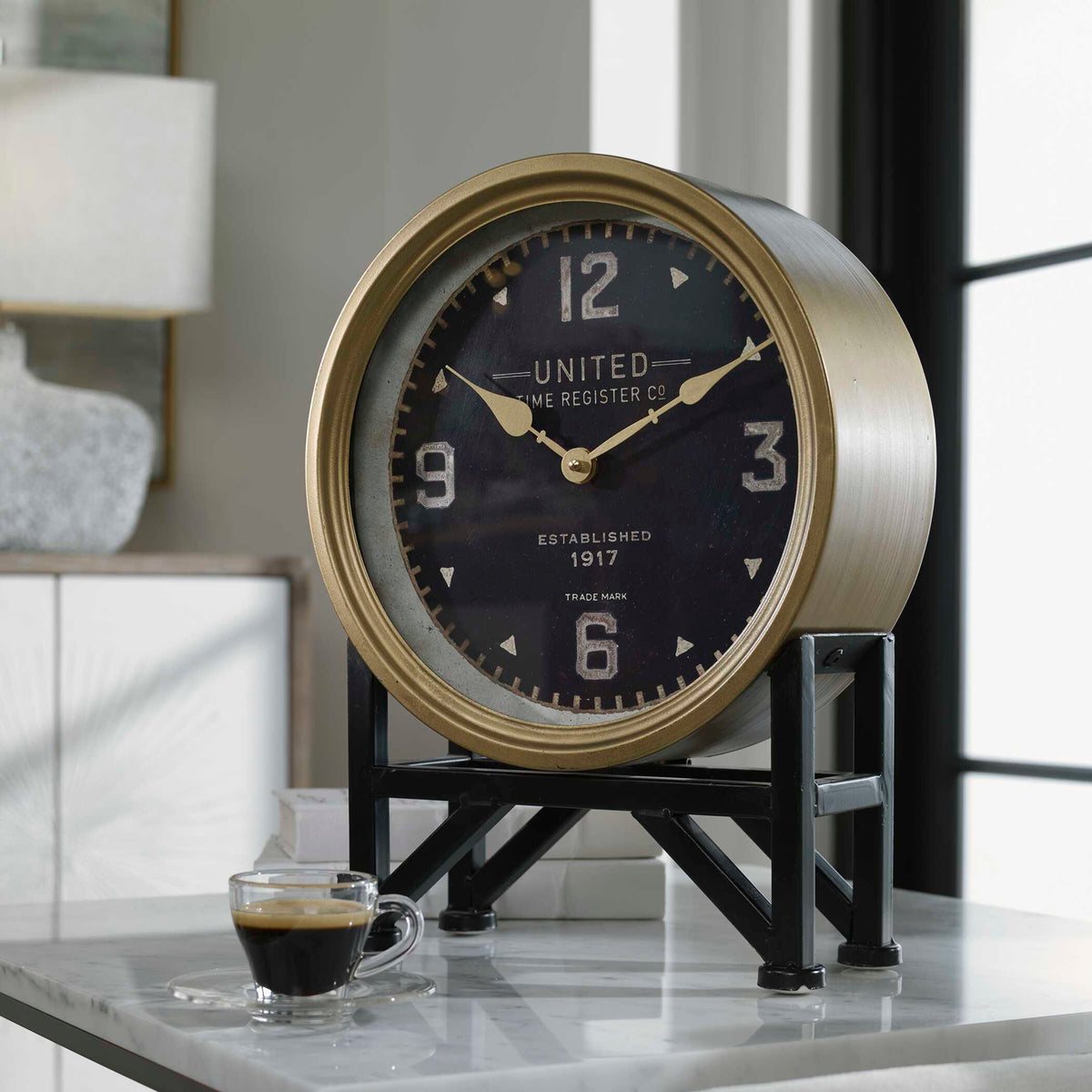 Dark Academia brass desk clock, 12 inch wide and 16 inch high, on a marble table