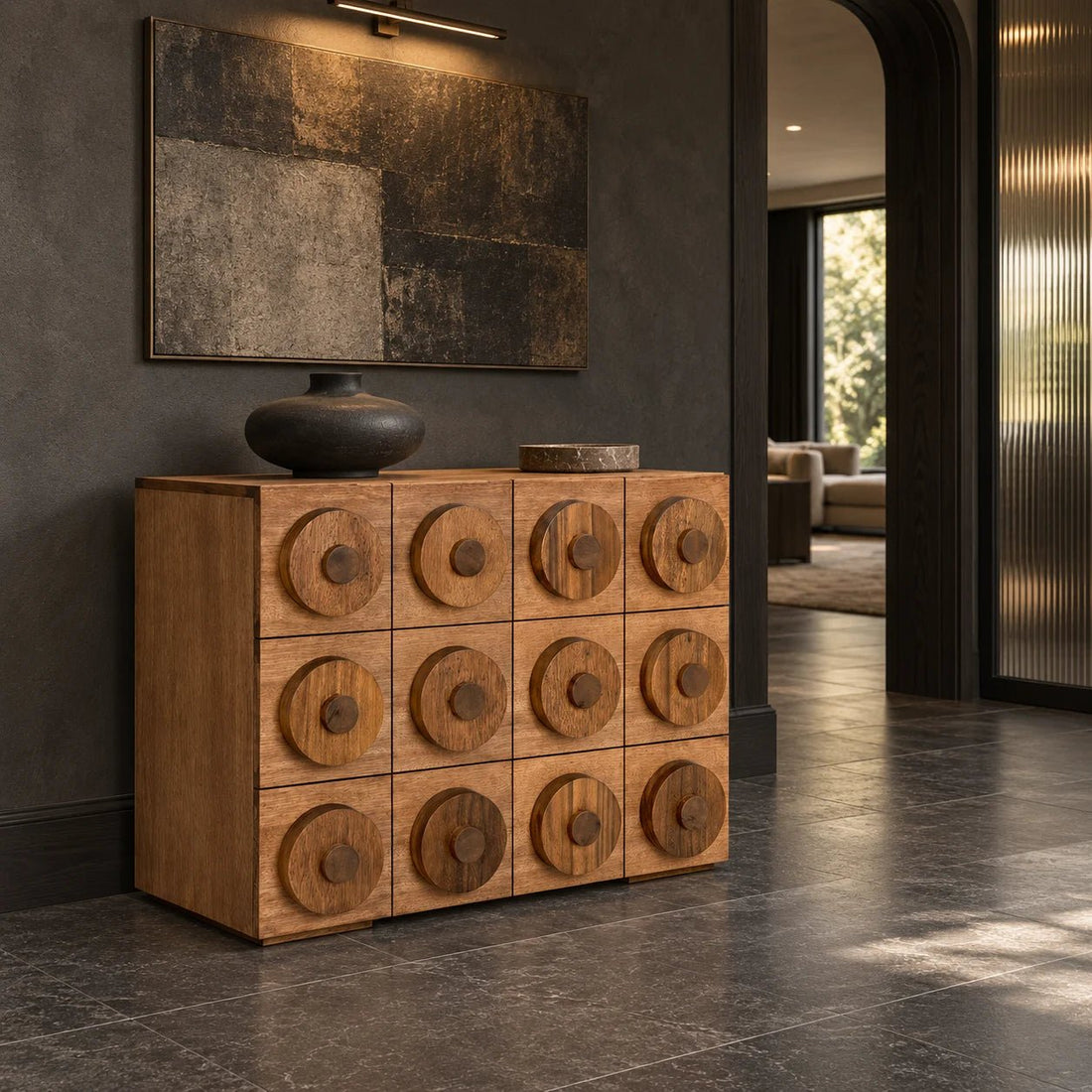 Lego Sideboard with 3 Drawers in Dark Walnut by Noir (GCON380DW). It has been expertly crafted of walnut and veneer and finished in a hand-applied Dark Walnut finish that reveals the natural veining and patterns of the wood. Shown in a living room.