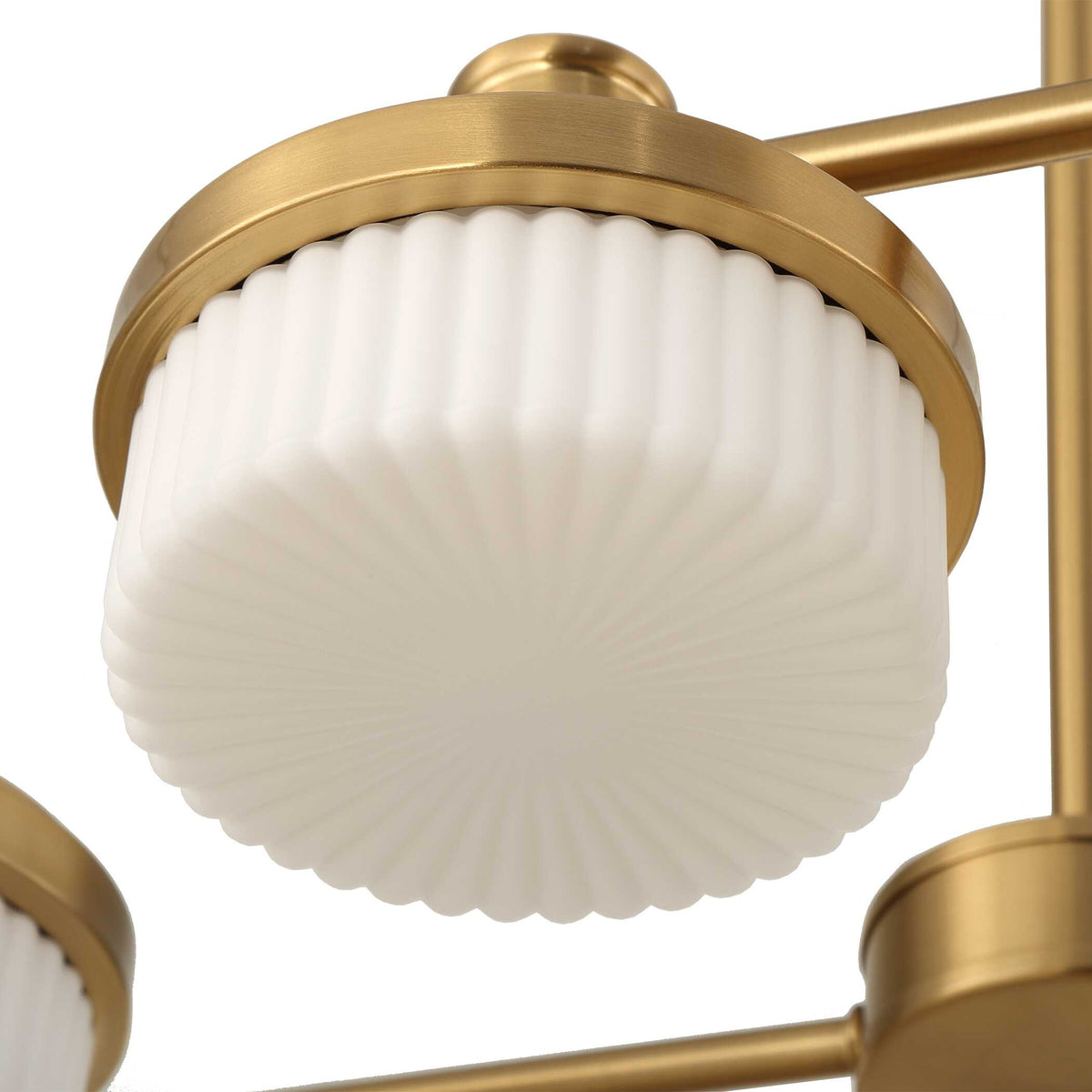 Bottom view of a fluted glass shade in its warm brass ring