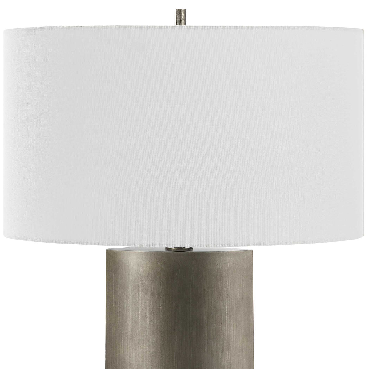 White oval drum hardback shade close up on a 19 inch wide sculptural iron nightstand lamp