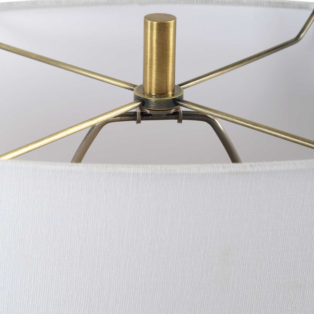 Inside the oval shade, plated brass finial and spider fitter of a 6.4 pound Organic Modern lamp