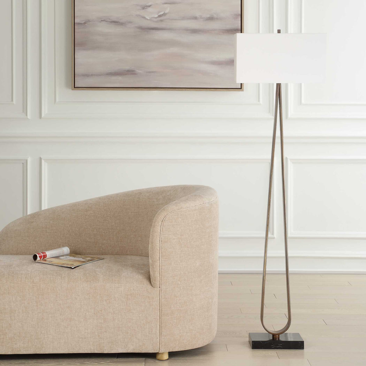 Art Deco reading lamp, 64.75 inch tall, hairpin bronze frame on a black marble foot in a living room