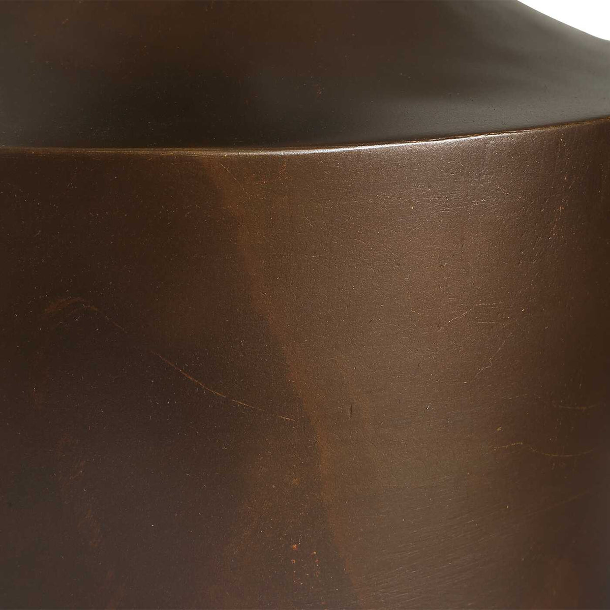 Close-up of the warm bronze finish on the curved base, 8 pound small table lamp