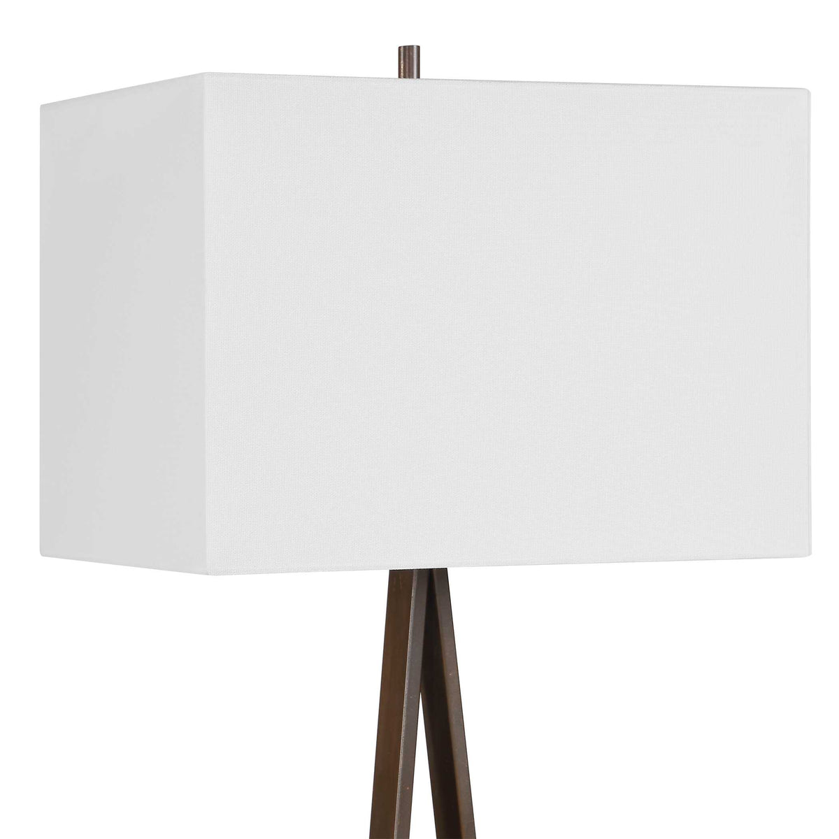 Close up of the white rectangular hardback shade and dark bronze iron arms of this Art Deco table lamp