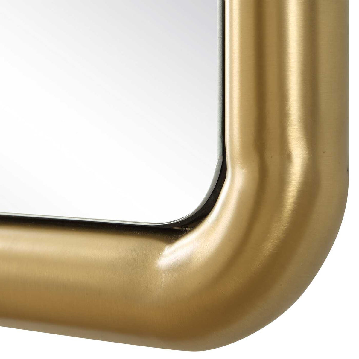 Organic modern and art deco accent mirror with a softly rounded plated antique brass frame