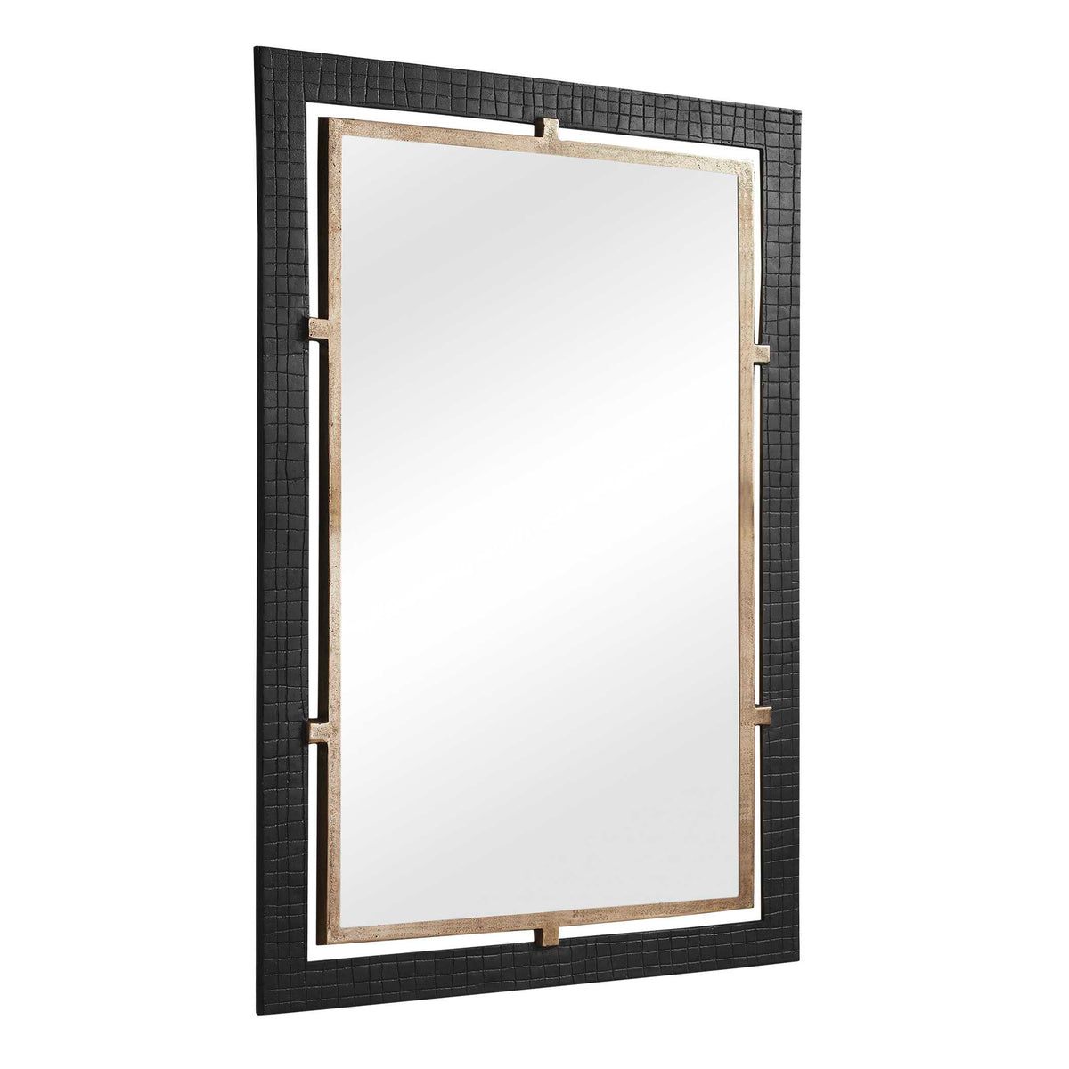 Angled view of the grooved outer frame and pitted brass inner frame