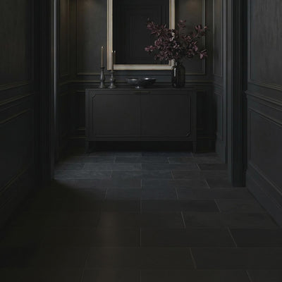 Short product video of the 26 Chateau Mirror - Antique Silver Leaf by Ambella Home, a tall decorative wall mirror with a circular crest and antique silver leaf finish styled above a dark entryway credenza
