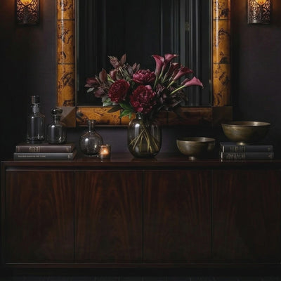 Short product video of Ambella Home Delancy Mirror in tortoise shell finish, 38W x 3D x 56H rectangular wall mirror above a dark credenza in a moody luxury hallway