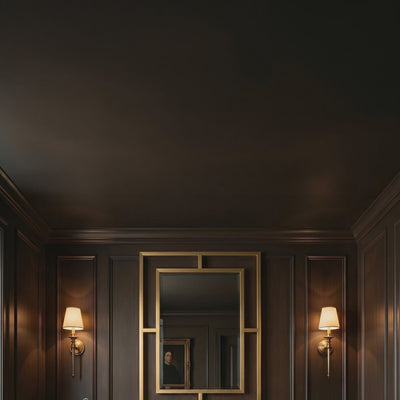 A short video of a luxurious bathroom with wooden vanity, large mirror, and wall lights.