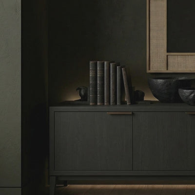 Short product video of James Martin Vanities Solene Mirror in Seaside Oak, 28W x 1.25D x 38H rectangular cane-detail wood-framed wall mirror above a dark credenza in a luxury hallway, pack of 2